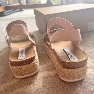 Steve Madden wedges. Size ten. Fits like a side 9. Beige. Only worn twice